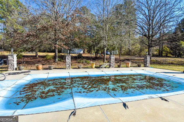 a backyard of a house with lots of green space