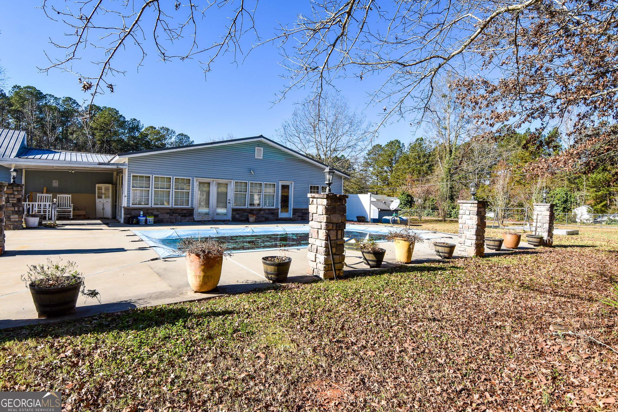 1256 Vaughn Road Griffin, GA 30223 - Photo 53 of 73 a view of a house with a patio