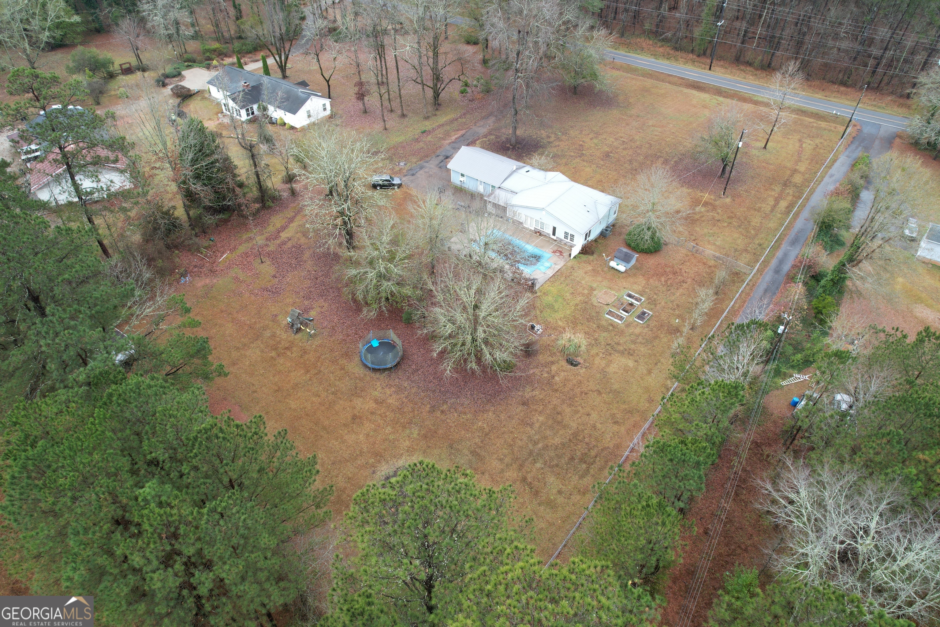 1256 Vaughn Road Griffin, GA 30223 - Photo 62 of 73 an aerial view of a house with a yard
