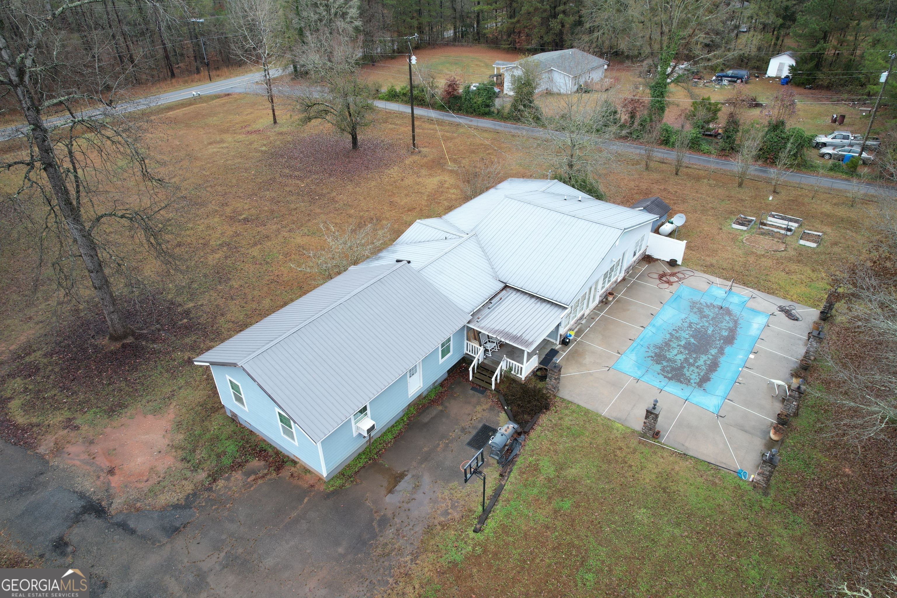 1256 Vaughn Road Griffin, GA 30223 - Photo 63 of 73 an aerial view of a house with outdoor space