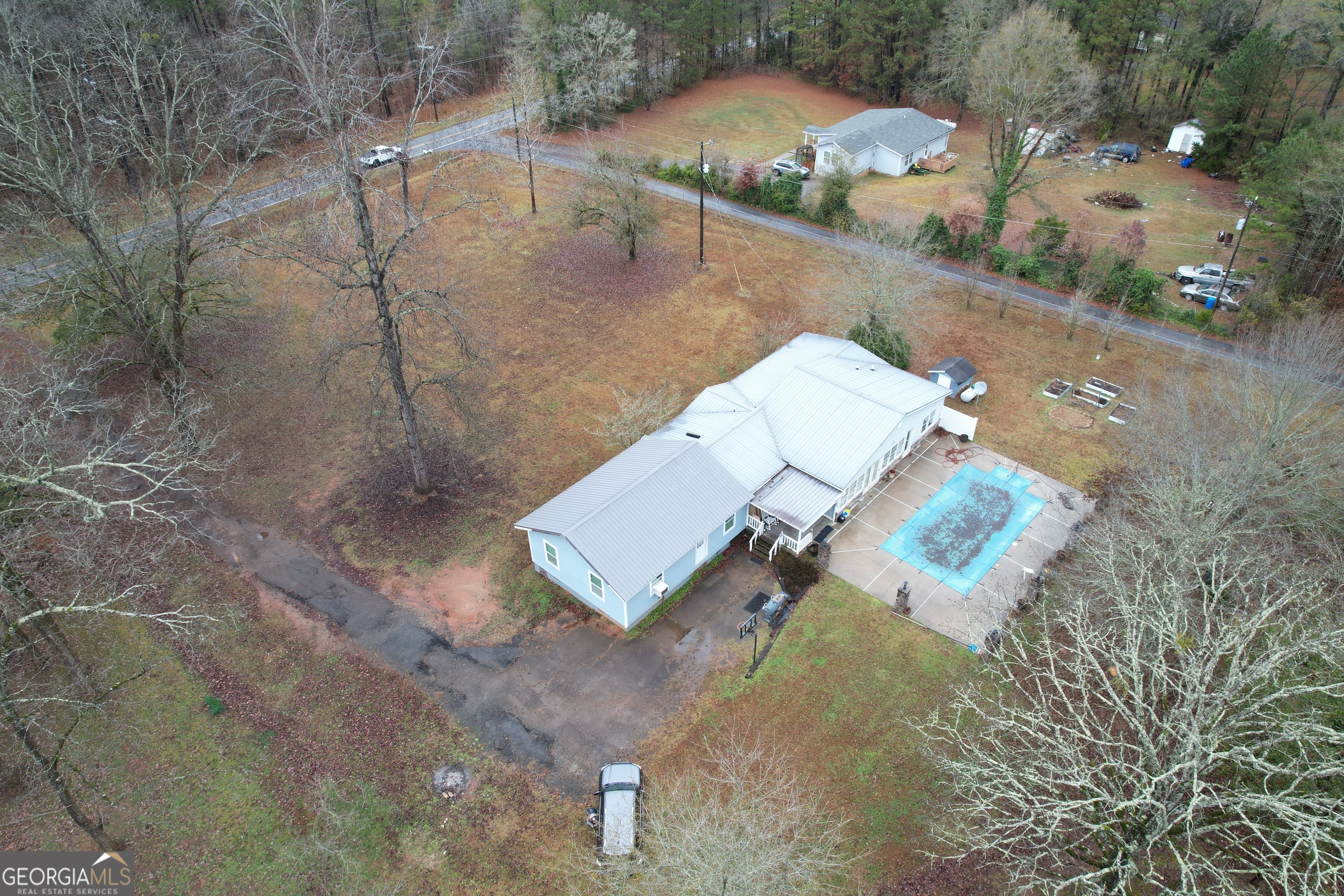 1256 Vaughn Road Griffin, GA 30223 - Photo 64 of 73 an aerial view of a house with a yard