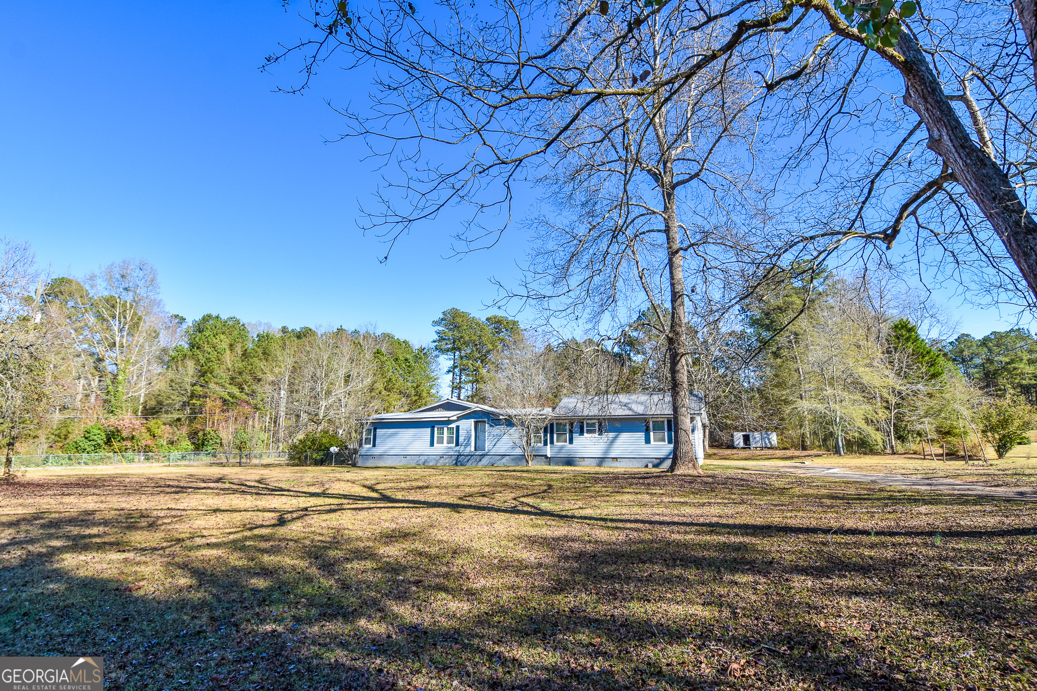 1256 Vaughn Road Griffin, GA 30223 - Photo 67 of 73 a view of street with trees