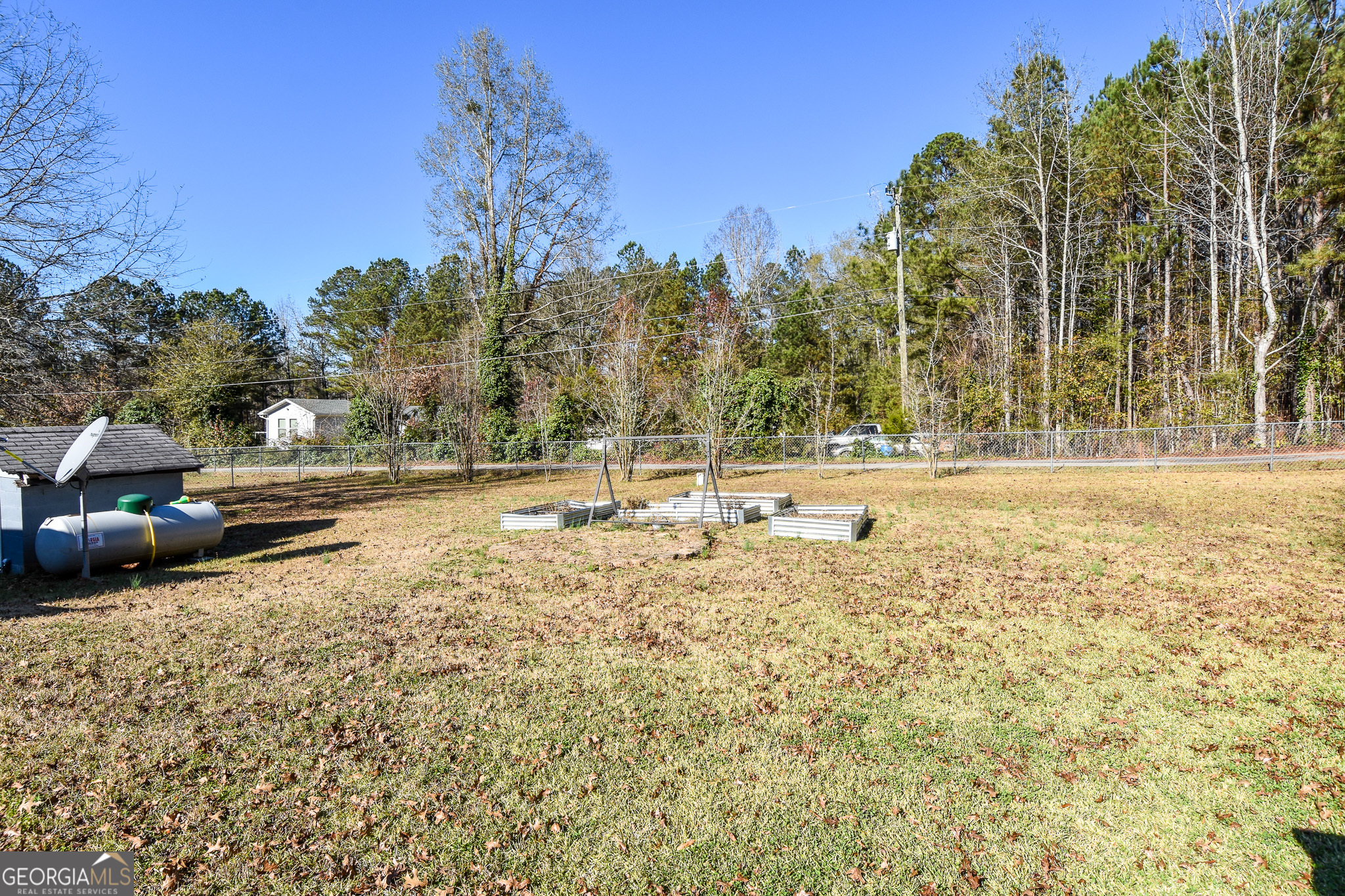 1256 Vaughn Road Griffin, GA 30223 - Photo 72 of 73 a view of a road with a building in the background