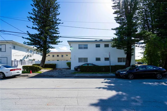 a cars parked in front of a house