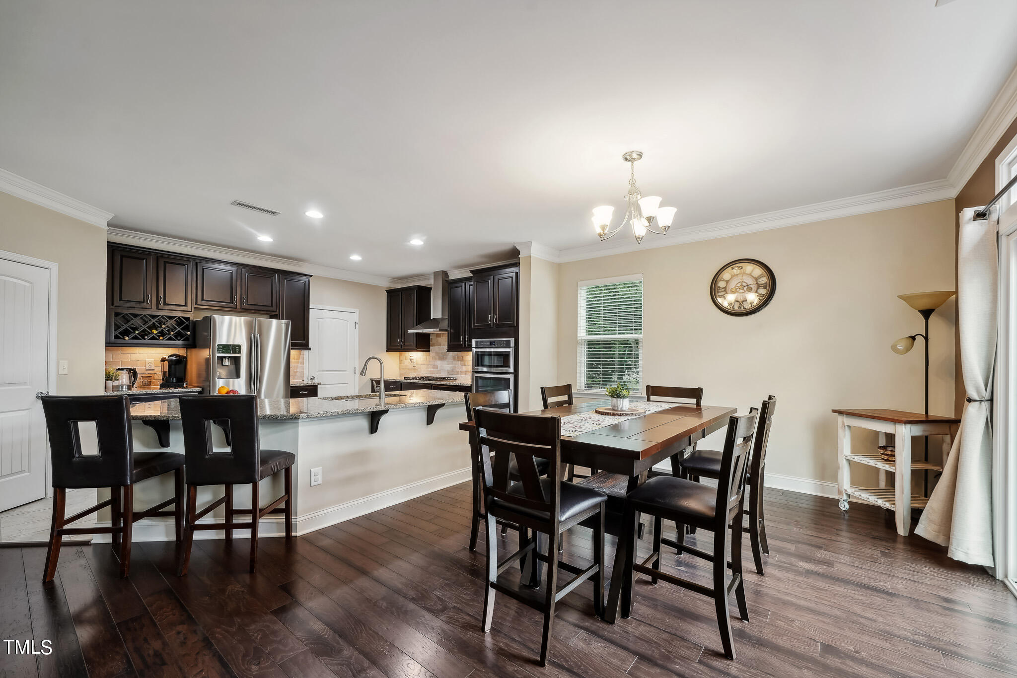 5608 Spring Glen Lane Raleigh, NC 27616 - Photo 14 of 30 a view of a dining room and livingroom view