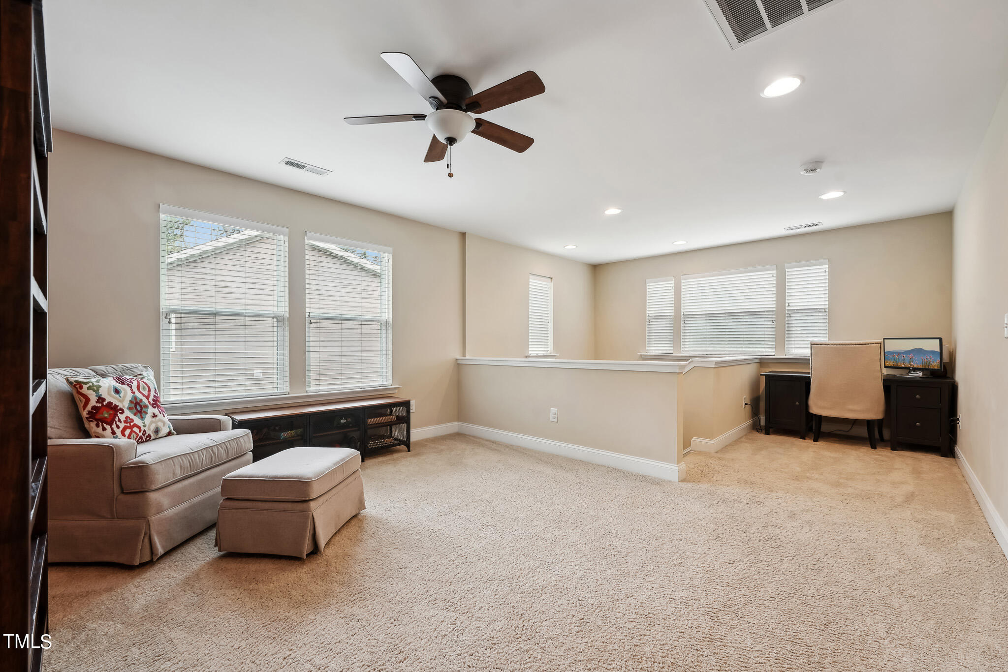5608 Spring Glen Lane Raleigh, NC 27616 - Photo 17 of 30 a living room with furniture and a window