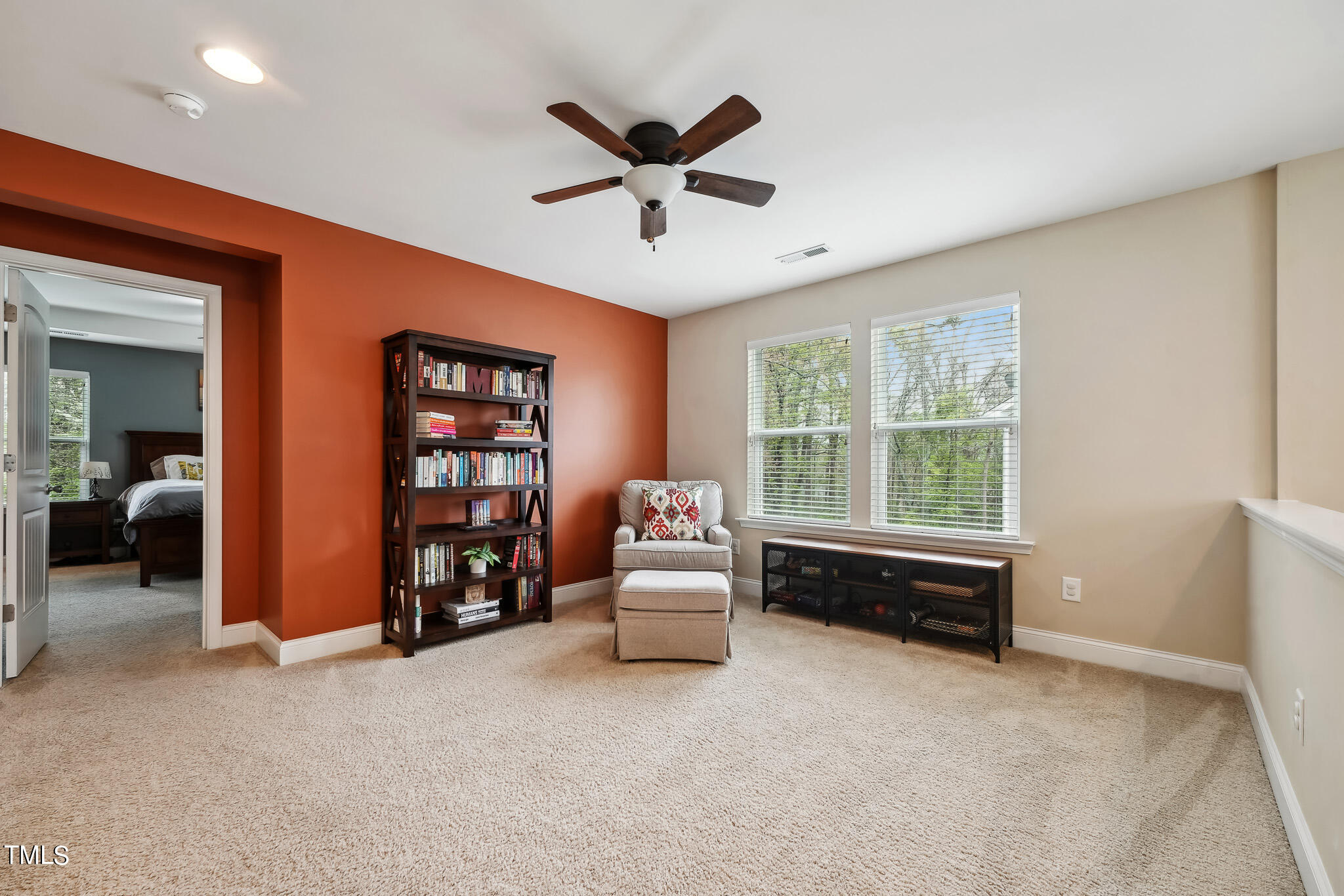 5608 Spring Glen Lane Raleigh, NC 27616 - Photo 18 of 30 a living room with furniture and a window