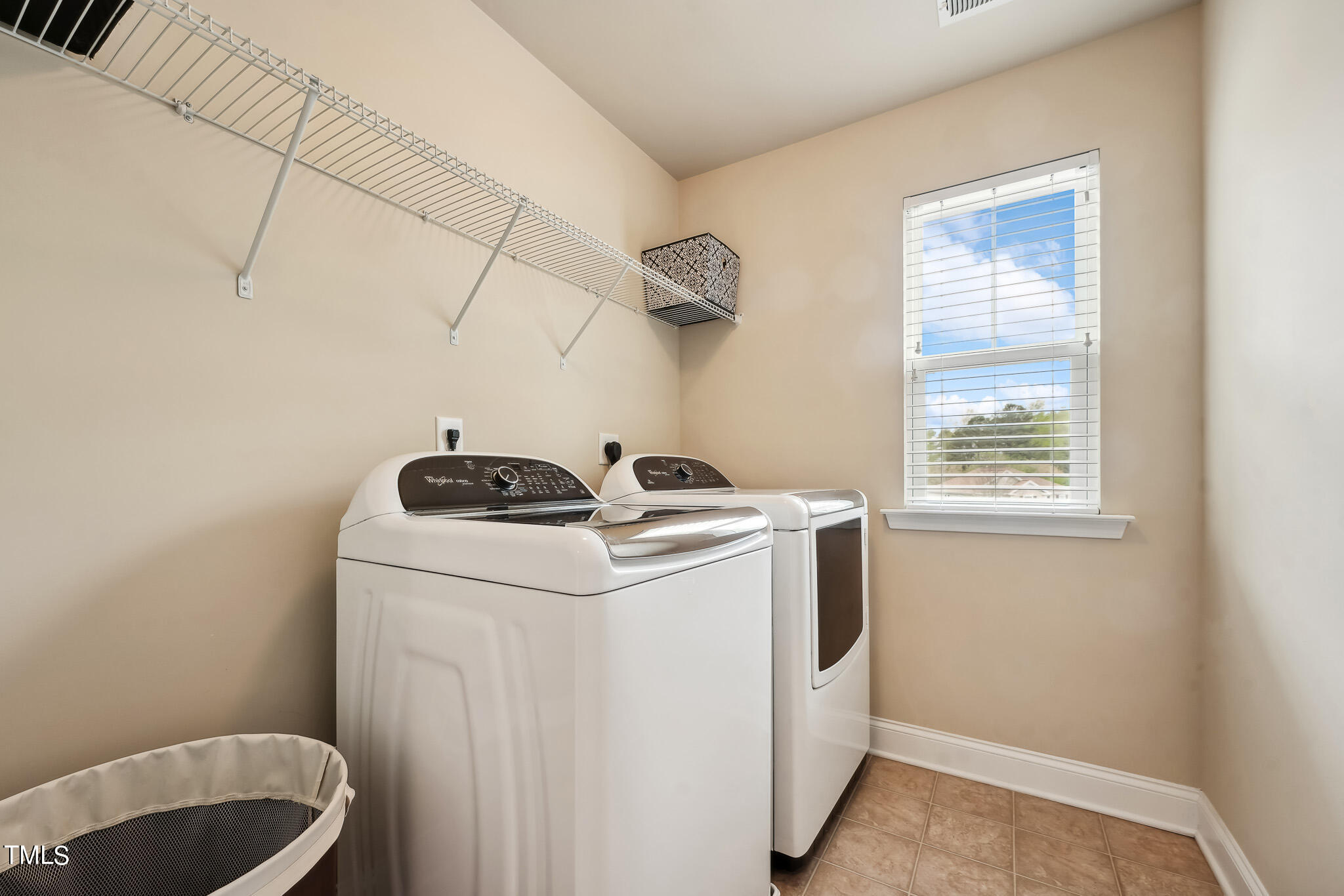 5608 Spring Glen Lane Raleigh, NC 27616 - Photo 26 of 30 a utility room with dryer and washer