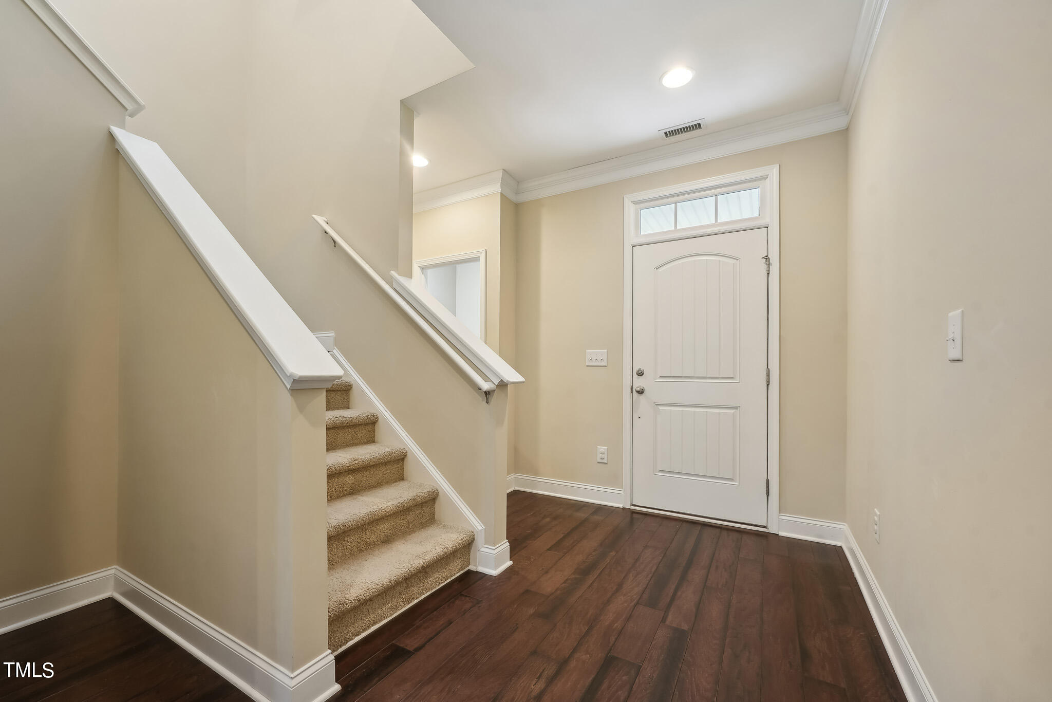 5608 Spring Glen Lane Raleigh, NC 27616 - Photo 4 of 30 a view of entryway with wooden floor