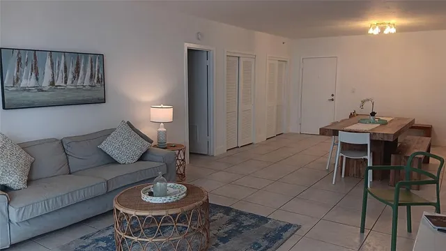 a kitchen with a sink a stove and a refrigerator