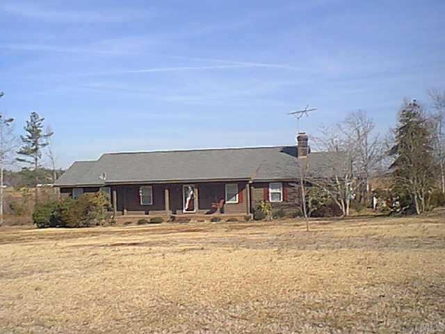 367 Frazier Road Spring Hope, NC 27882 - Photo 1 of 1 a front view of a building with large trees