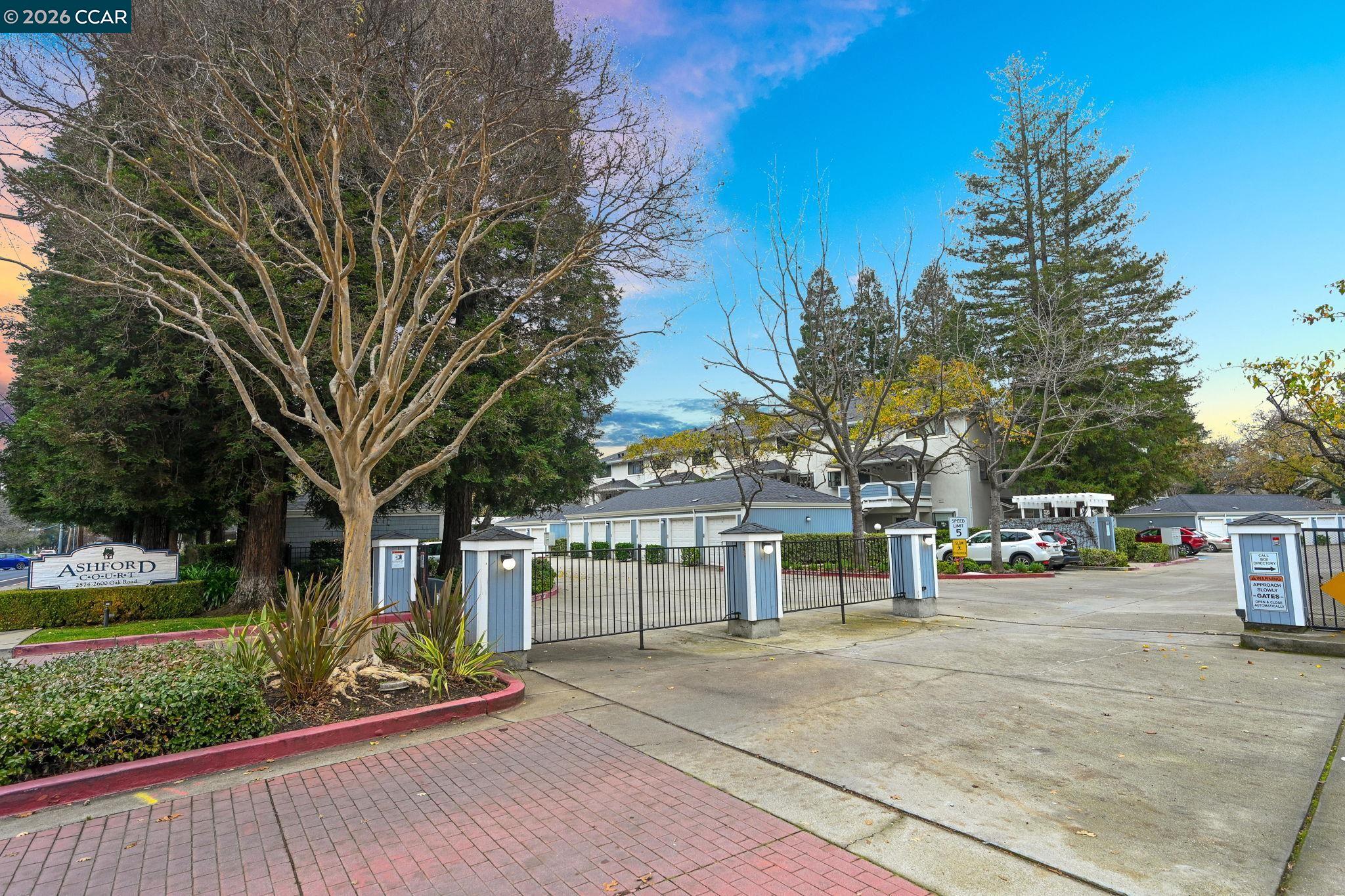 2586 Oak Road, Unit 130 Walnut Creek, CA 94597 - Photo 26 of 31 a view of street with parked cars