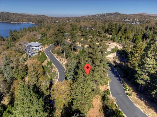 an aerial view of residential house with parking space