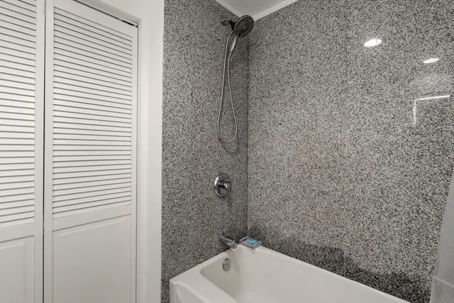 a terrace with a table and chairs