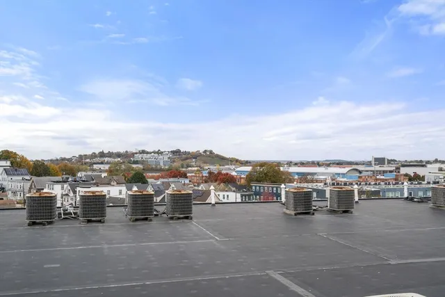 a projector room with furniture and a projector screen