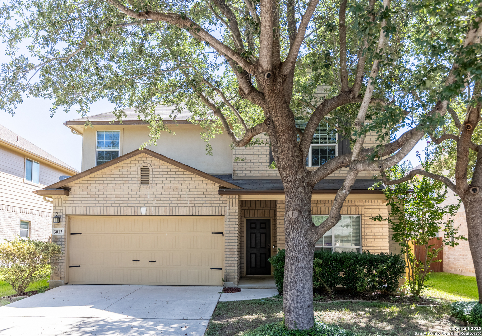 3013 Muntjac Schertz, TX 78154 - Photo 2 of 40 a view of a house with a tree in front