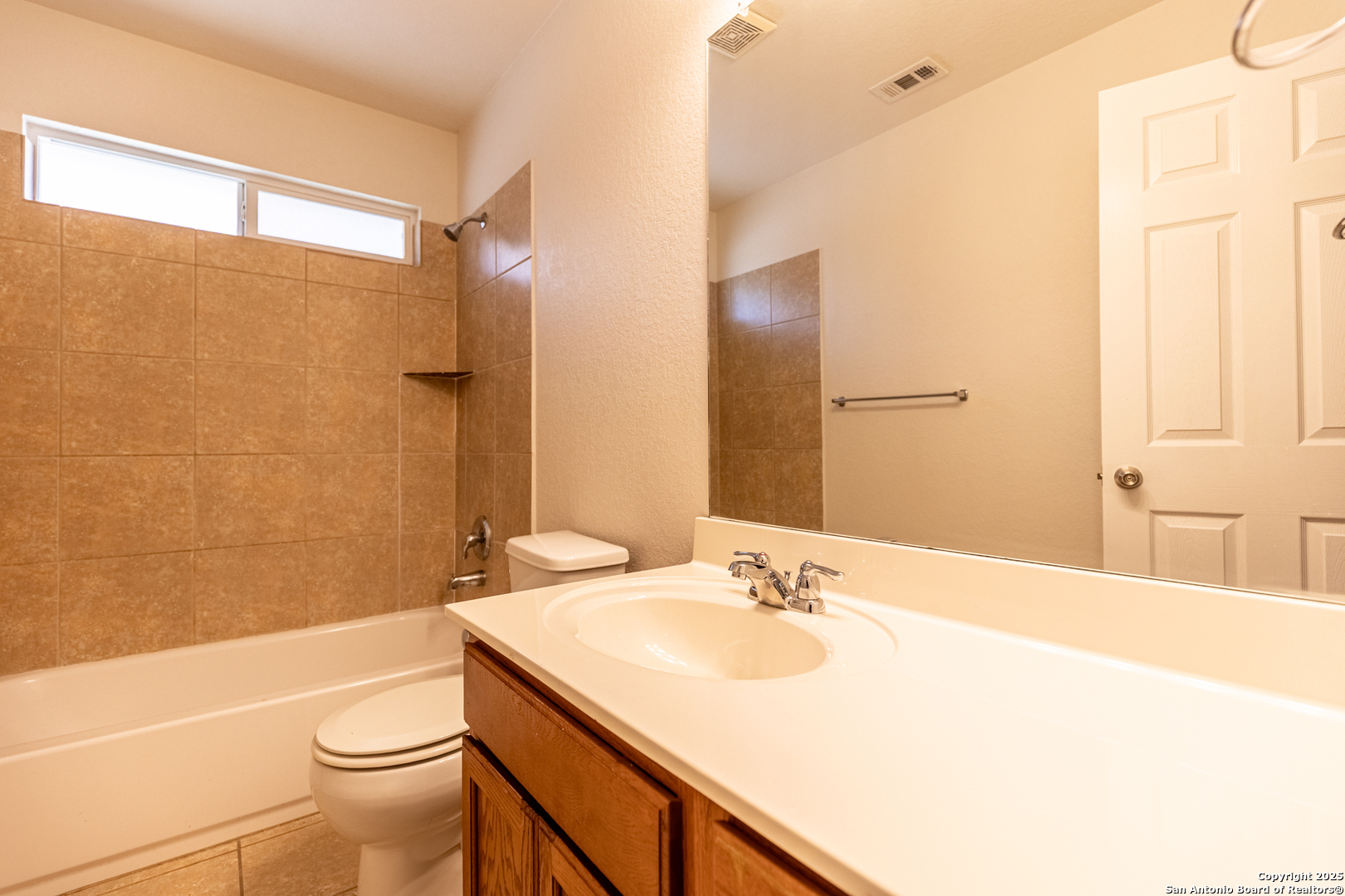 3013 Muntjac Schertz, TX 78154 - Photo 31 of 40 a bathroom with a sink toilet vanity and shower