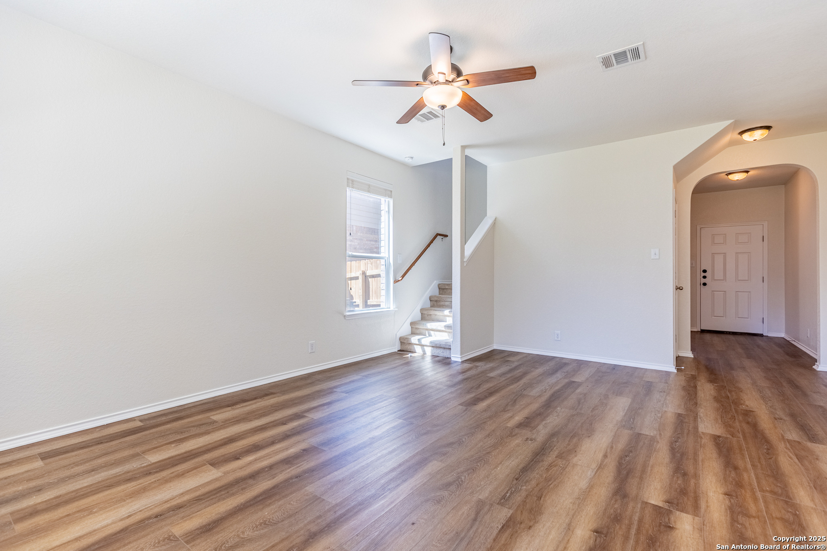 3013 Muntjac Schertz, TX 78154 - Photo 10 of 40 a view of empty room with wooden floor and fan