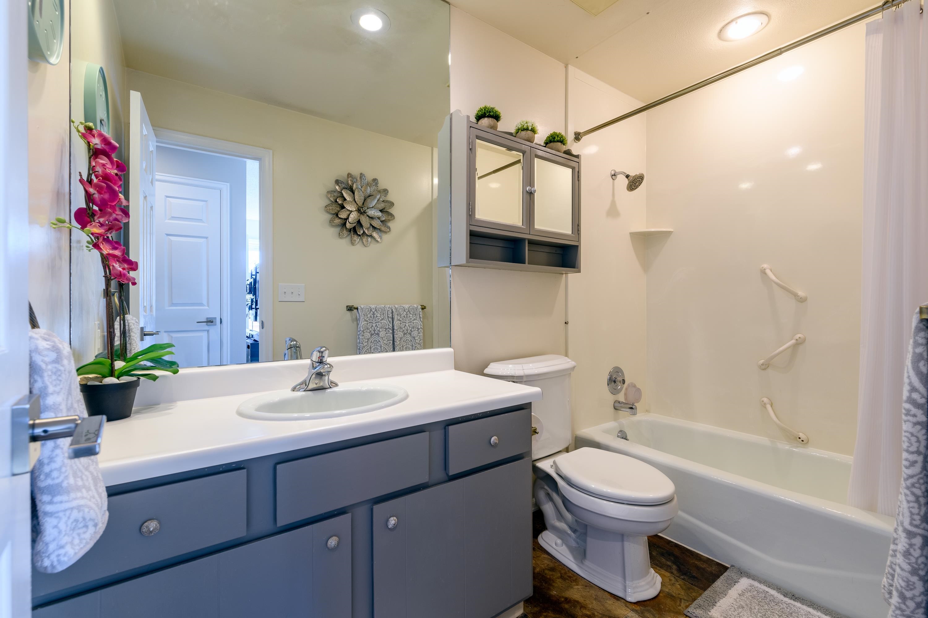 2700 G Road, Unit 5C Grand Junction, CO 81506 - Photo 15 of 25 a bathroom with a sink a toilet and shower