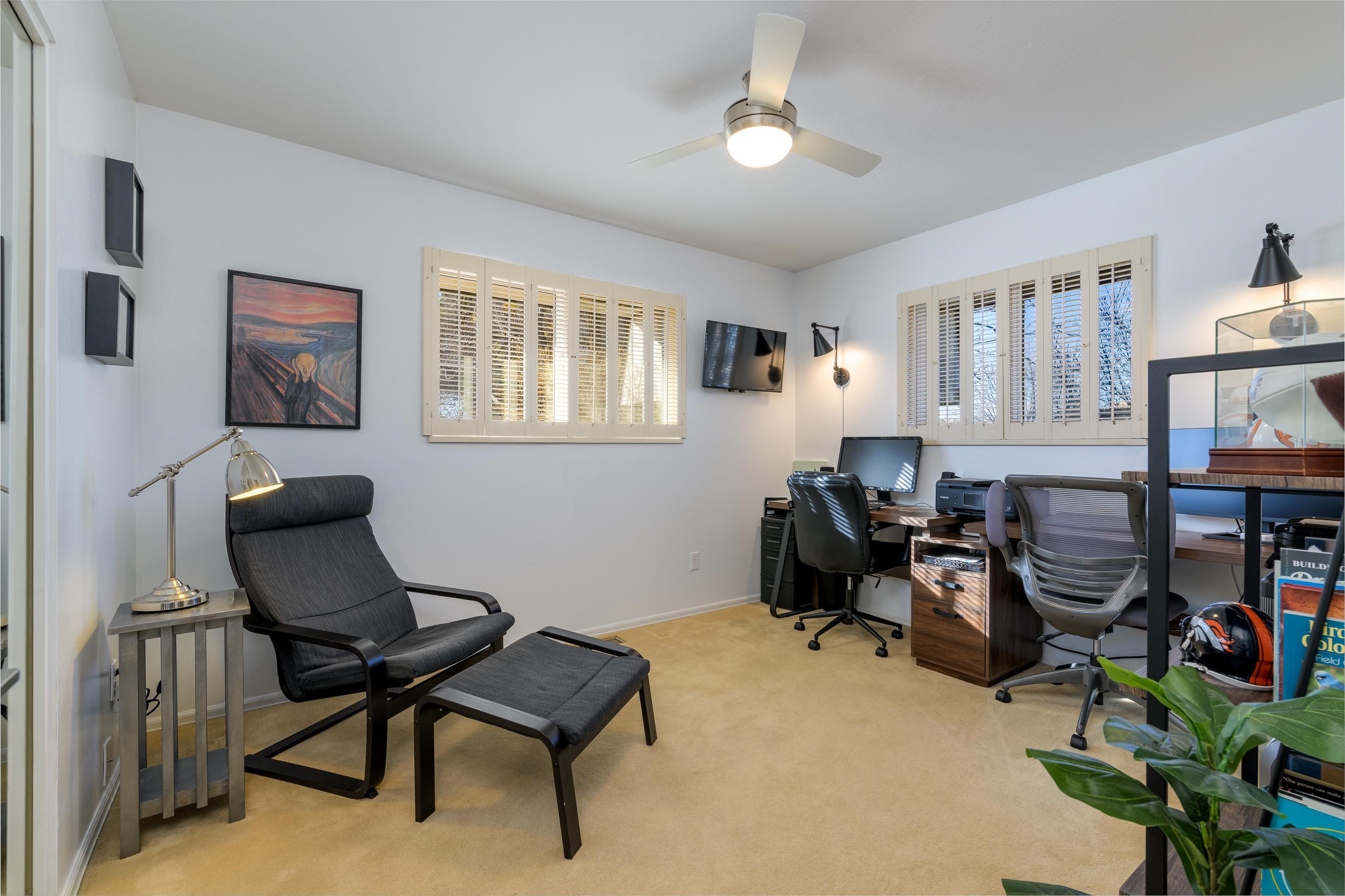2700 G Road, Unit 5C Grand Junction, CO 81506 - Photo 19 of 25 a living room with furniture piano and a window