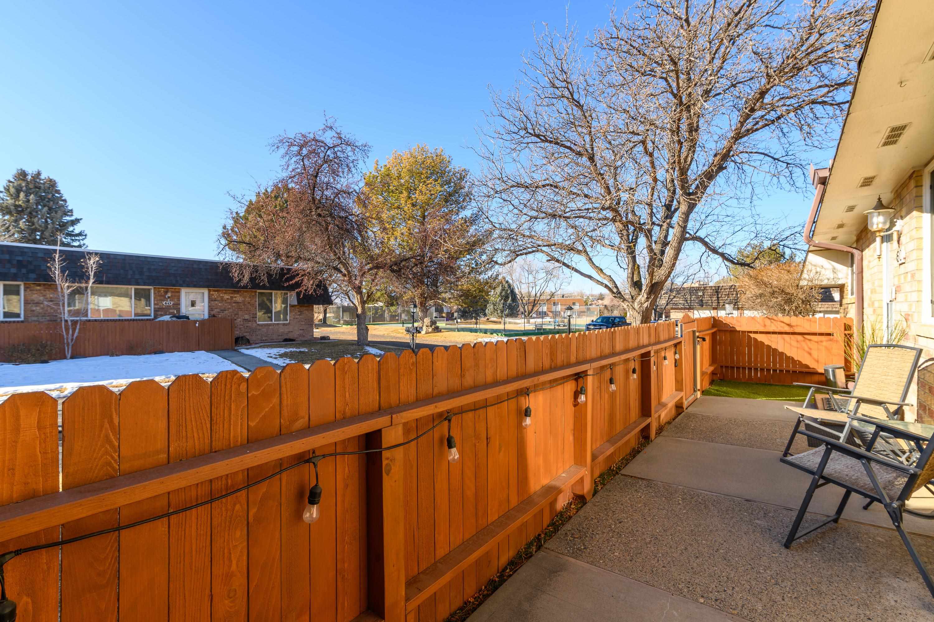 2700 G Road, Unit 5C Grand Junction, CO 81506 - Photo 3 of 25 a view of a house with wooden fence