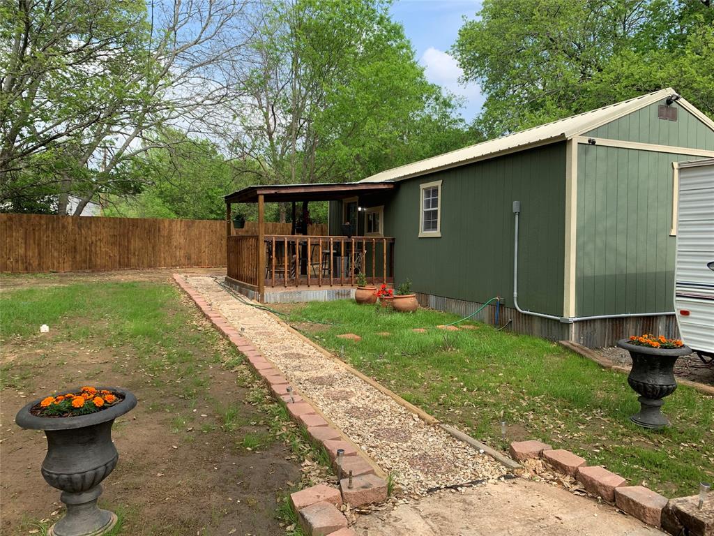 111 Live Oak Loop Whitney, TX 76692 - Photo 1 of 1 View of yard featuring fence