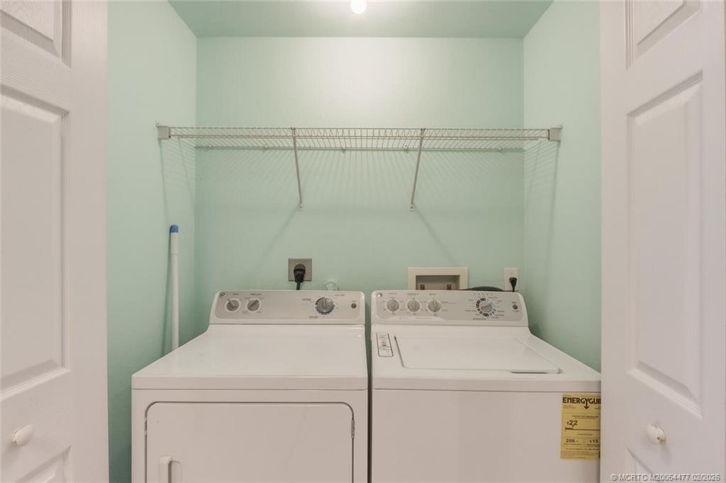 726 Southwest Bond Road Port St. Lucie, FL 34953 - Photo 17 of 31 a utility room with dryer and washer