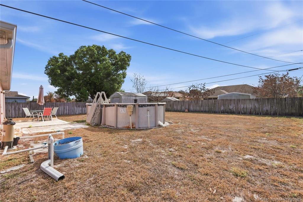 726 Southwest Bond Road Port St. Lucie, FL 34953 - Photo 25 of 31 a view of a backyard