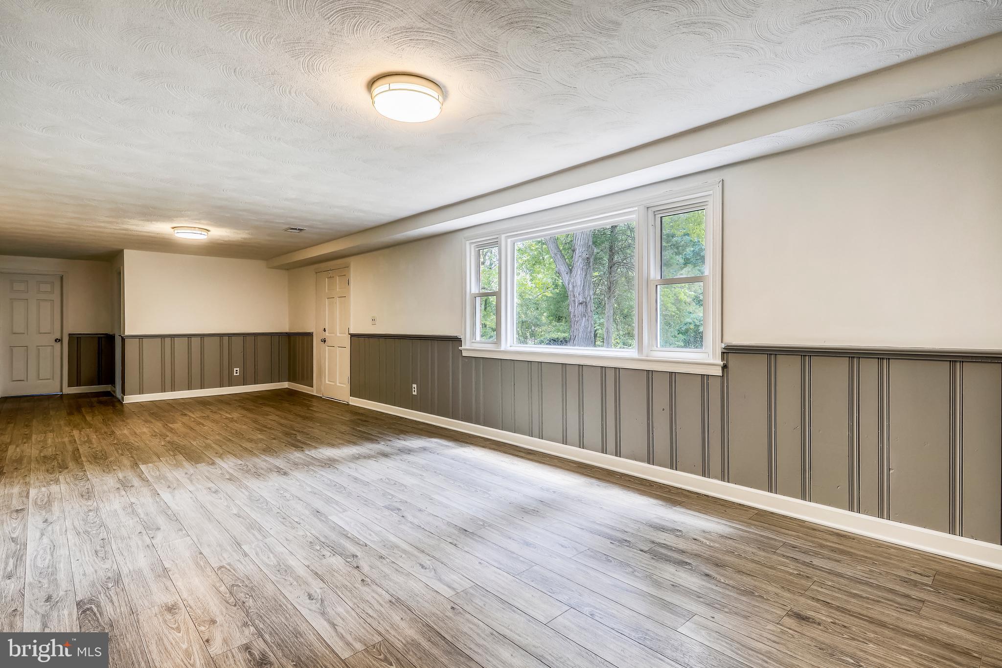 4501 Henderson Road Temple Hills, MD 20748 - Photo 24 of 45 Lower level family room