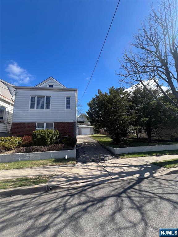 44 Scudder Street Garfield, NJ 07026 - Photo 1 of 21 a view of a house with a yard
