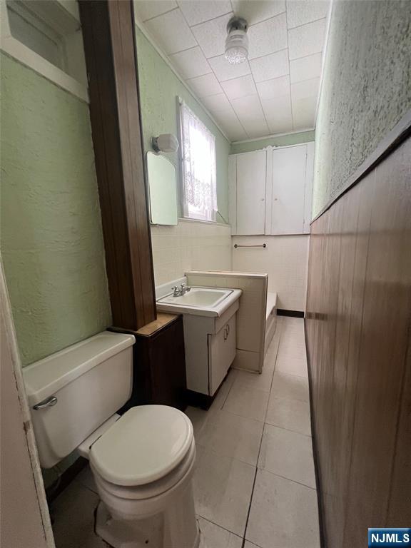 44 Scudder Street Garfield, NJ 07026 - Photo 8 of 21 a bathroom with a sink toilet and shower