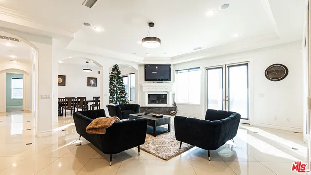 a kitchen with stainless steel appliances kitchen island granite countertop a sink and cabinets