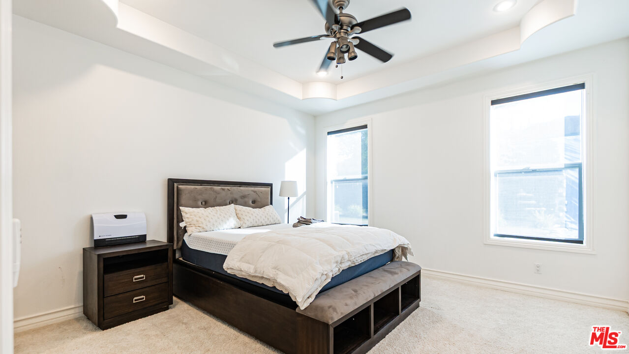 8321 Overview Court Yucaipa, CA 92399 - Photo 28 of 75 a bedroom with a bed and window