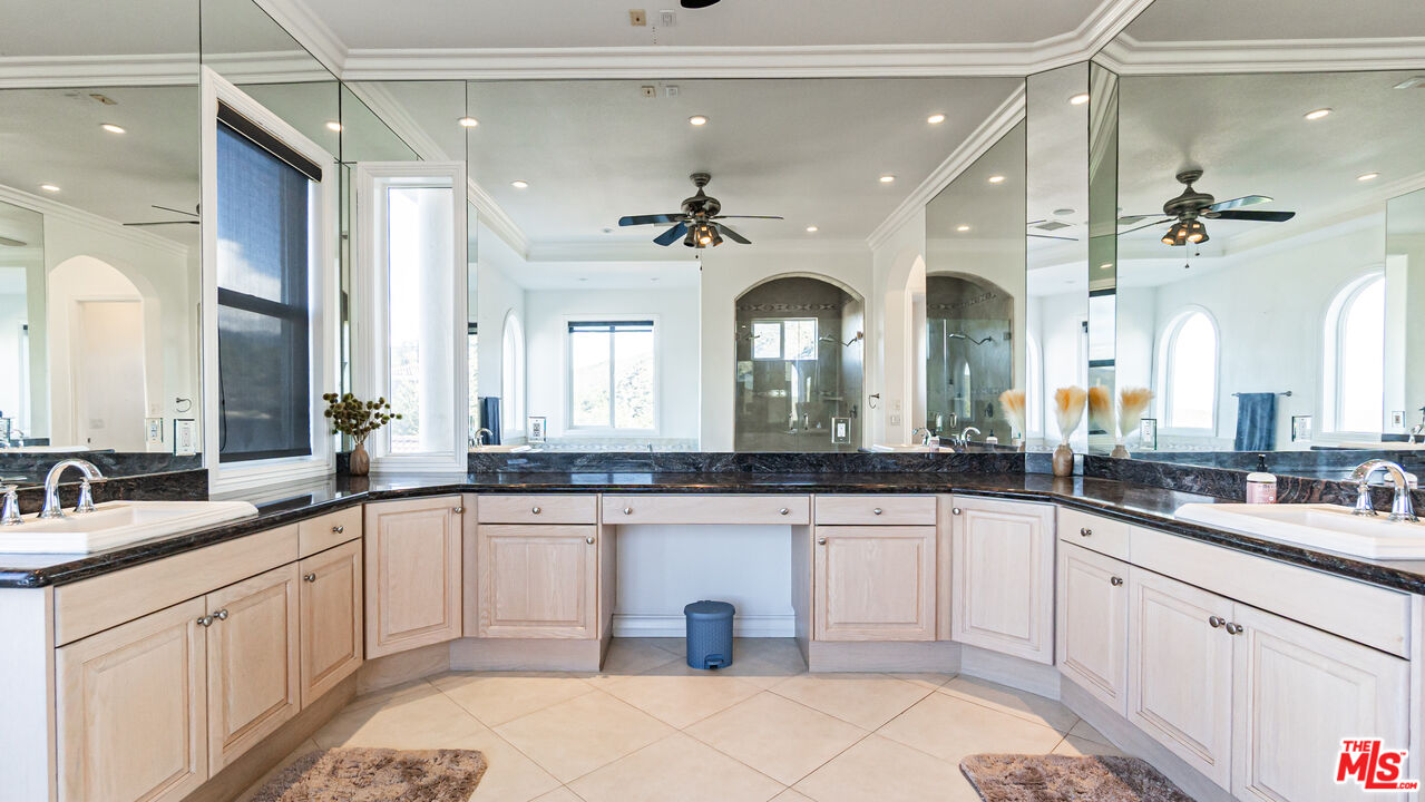 8321 Overview Court Yucaipa, CA 92399 - Photo 37 of 75 a large kitchen with cabinets a sink and dishwasher