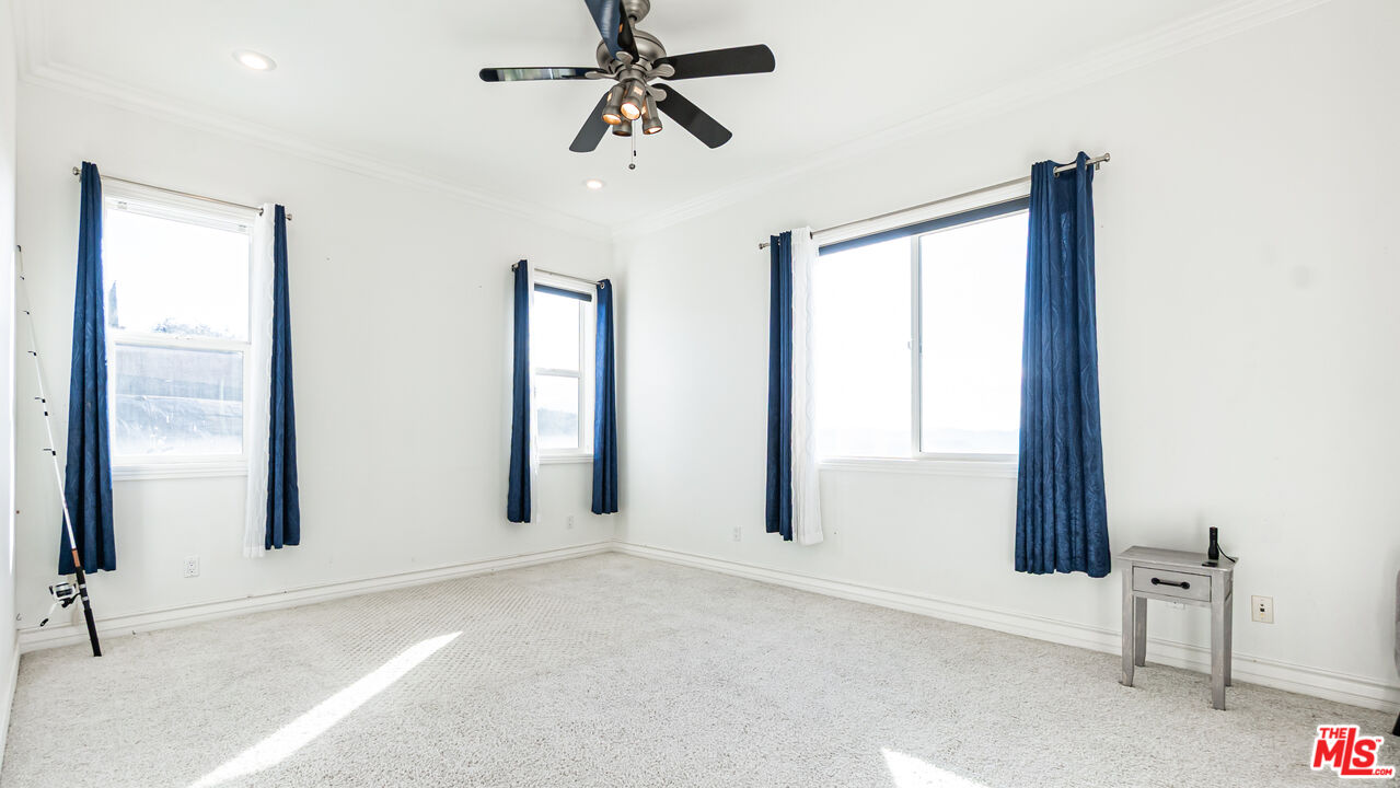 8321 Overview Court Yucaipa, CA 92399 - Photo 45 of 75 an empty room with windows and closet