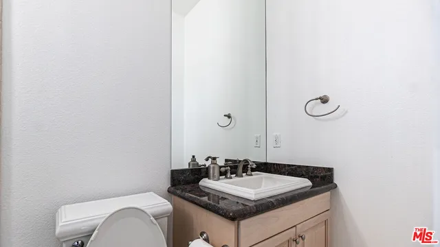 a view of a city with mountains in the background