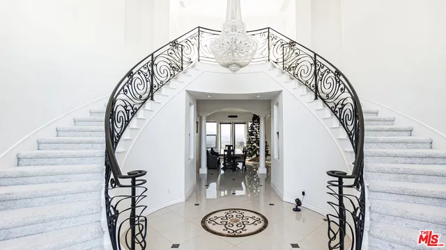 a view of entryway livingroom and hall
