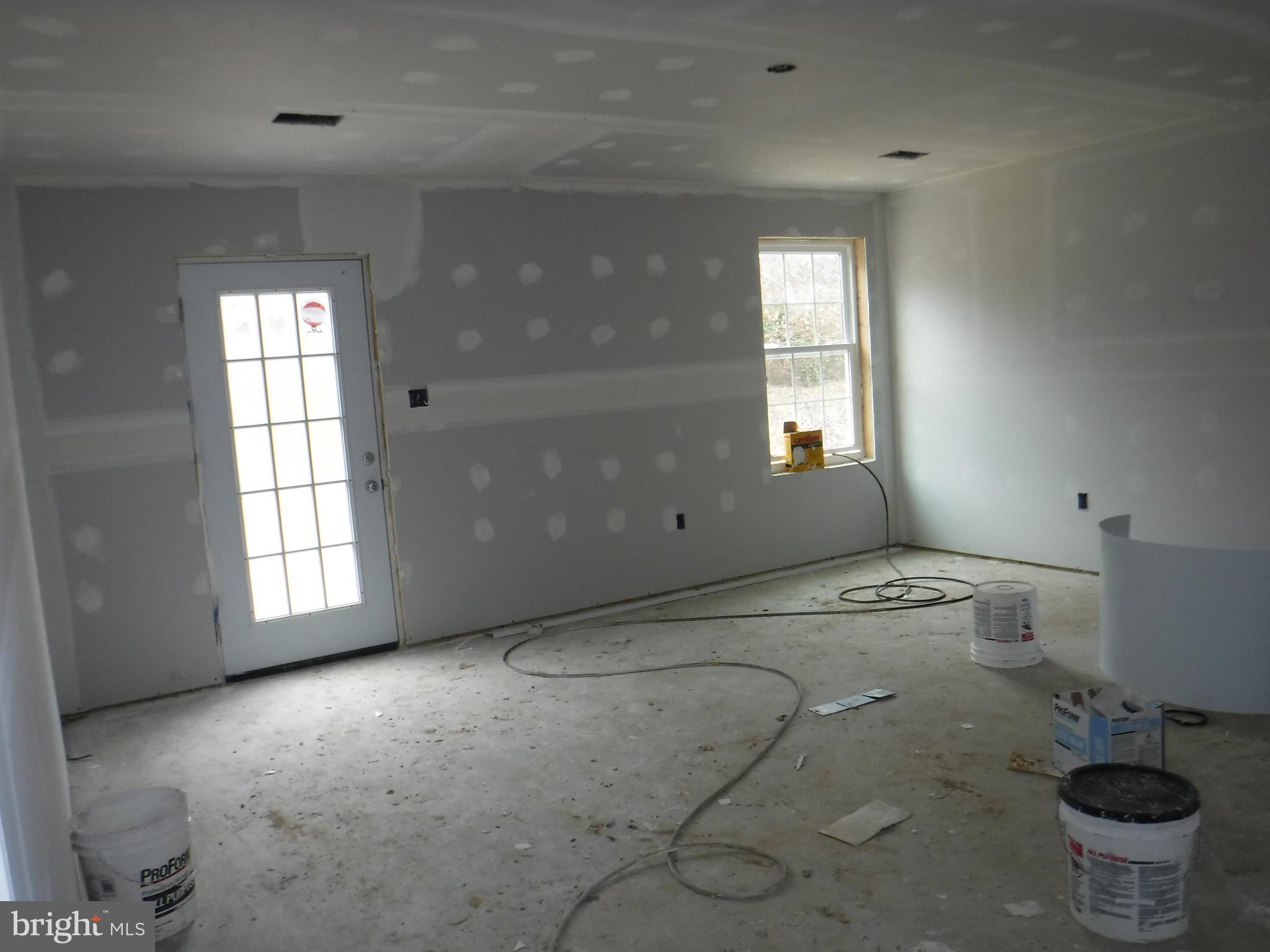 7410 Mountain Laurel Road Boonsboro, MD 21713 - Photo 22 of 23 family rm walks out to private patio