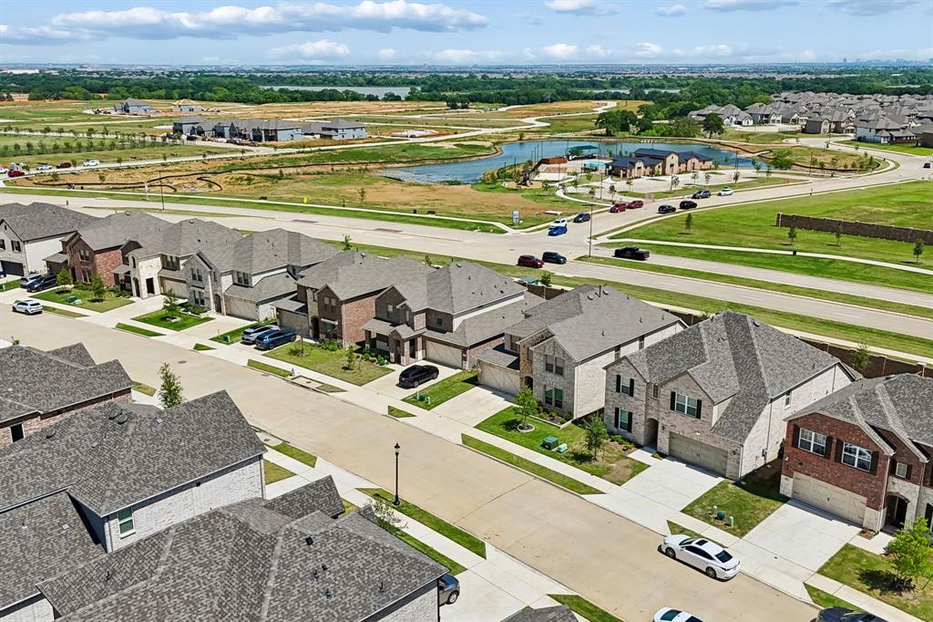 425 Breeds Hl Road Little Elm, TX 75068 - Photo 35 of 38 an aerial view of a house with a ocean view