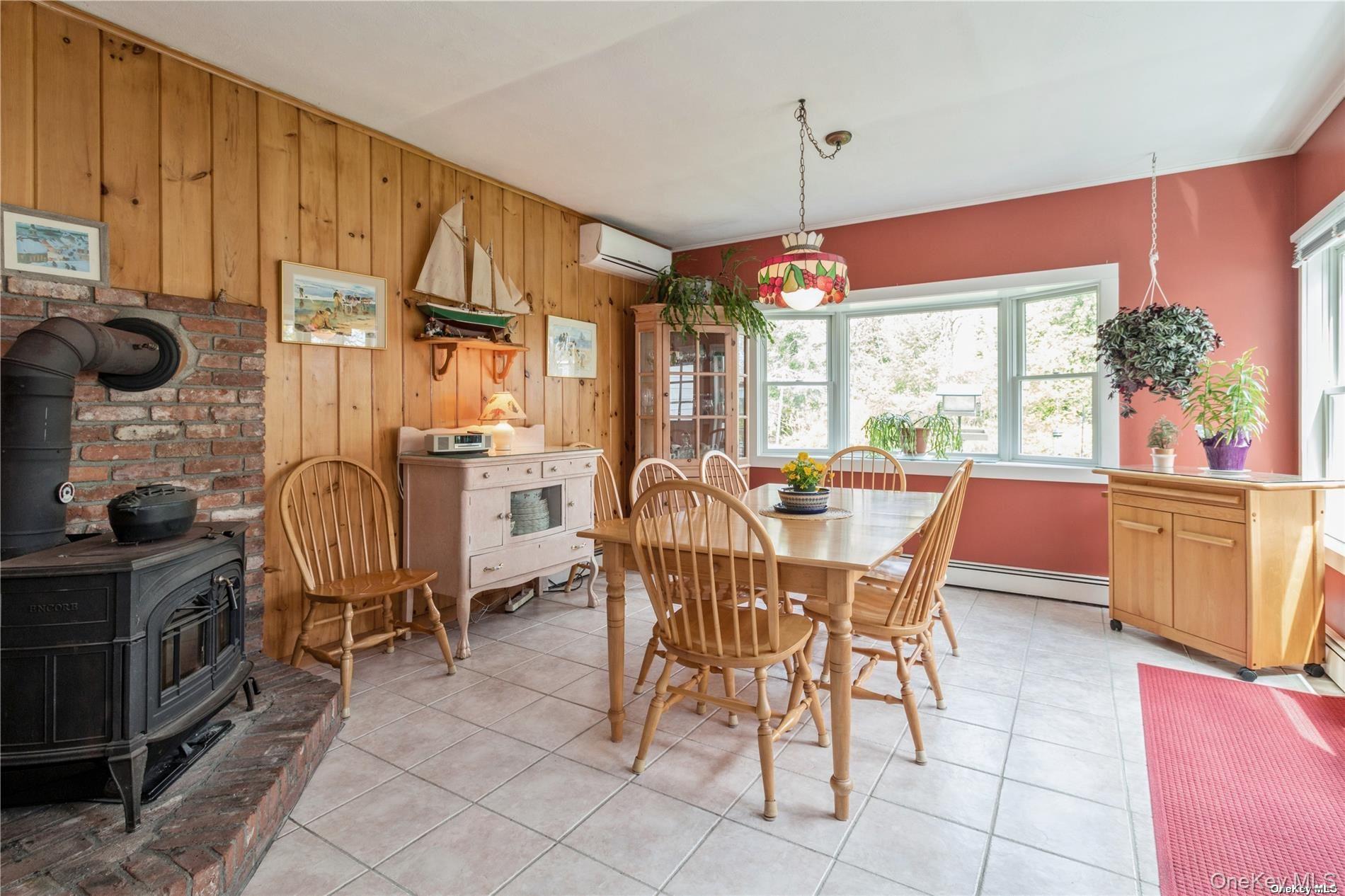 695 Rogers Road Southold, NY 11971 - Photo 6 of 20 Large dining area with sliders to 2 level deck