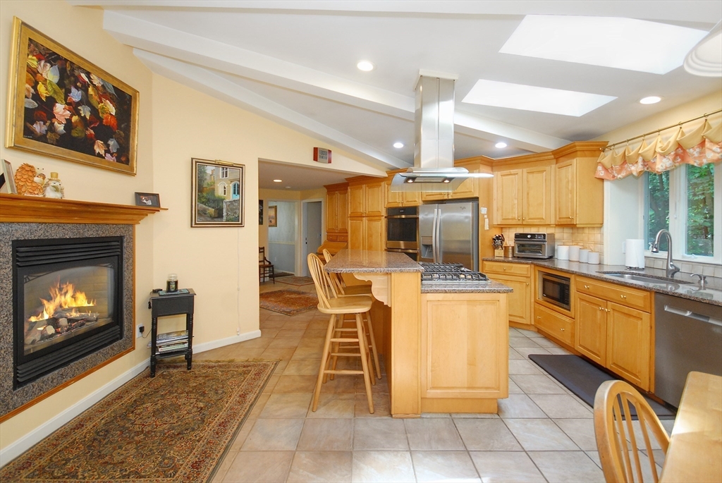 41 Clarissa Road Chelmsford, MA 01824 - Photo 12 of 26 a kitchen with a sink cabinets and appliances