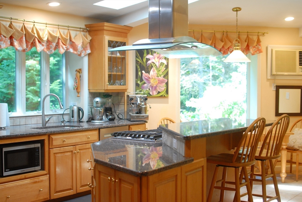 41 Clarissa Road Chelmsford, MA 01824 - Photo 15 of 26 a kitchen with a sink and a large window