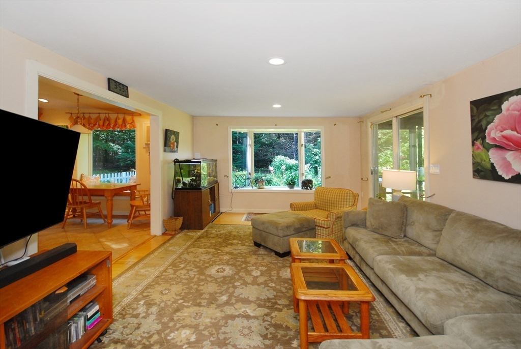 41 Clarissa Road Chelmsford, MA 01824 - Photo 24 of 26 a living room with furniture and a flat screen tv