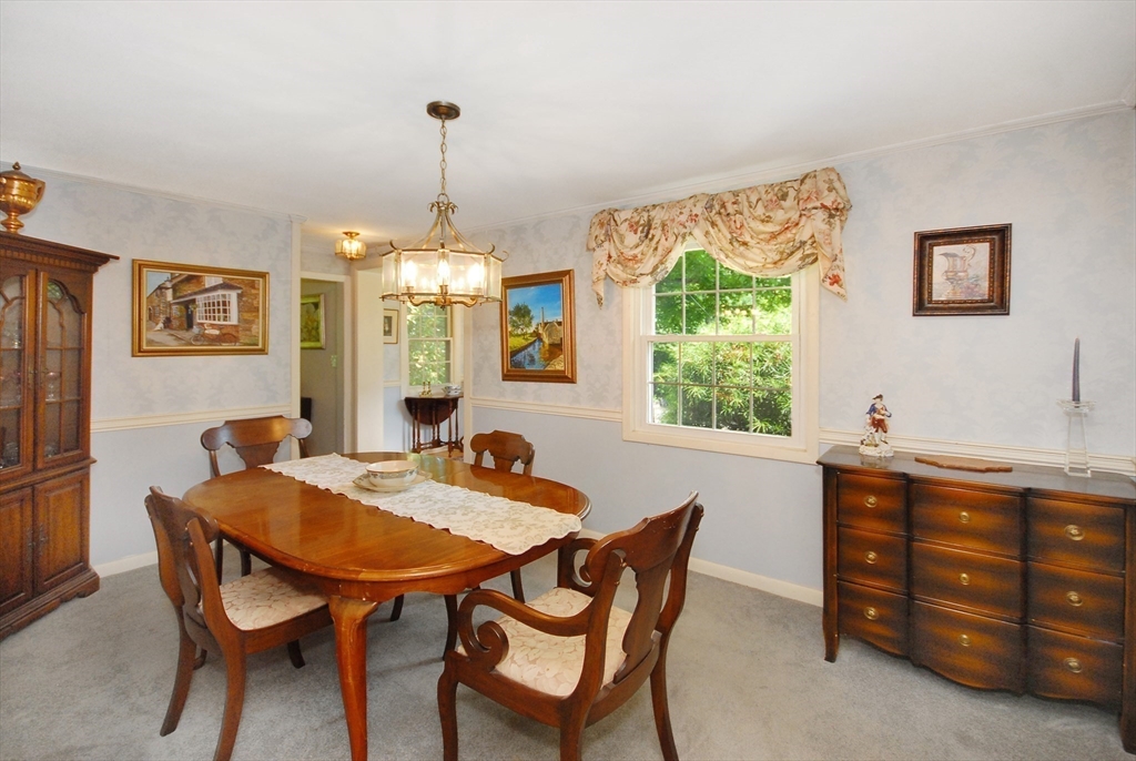 41 Clarissa Road Chelmsford, MA 01824 - Photo 5 of 26 a view of a dining room and chandelier