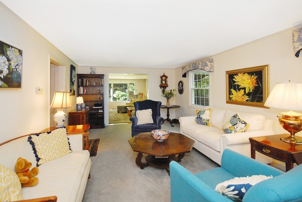 41 Clarissa Road Chelmsford, MA 01824 - Photo 7 of 26 a living room with furniture and a wooden floor