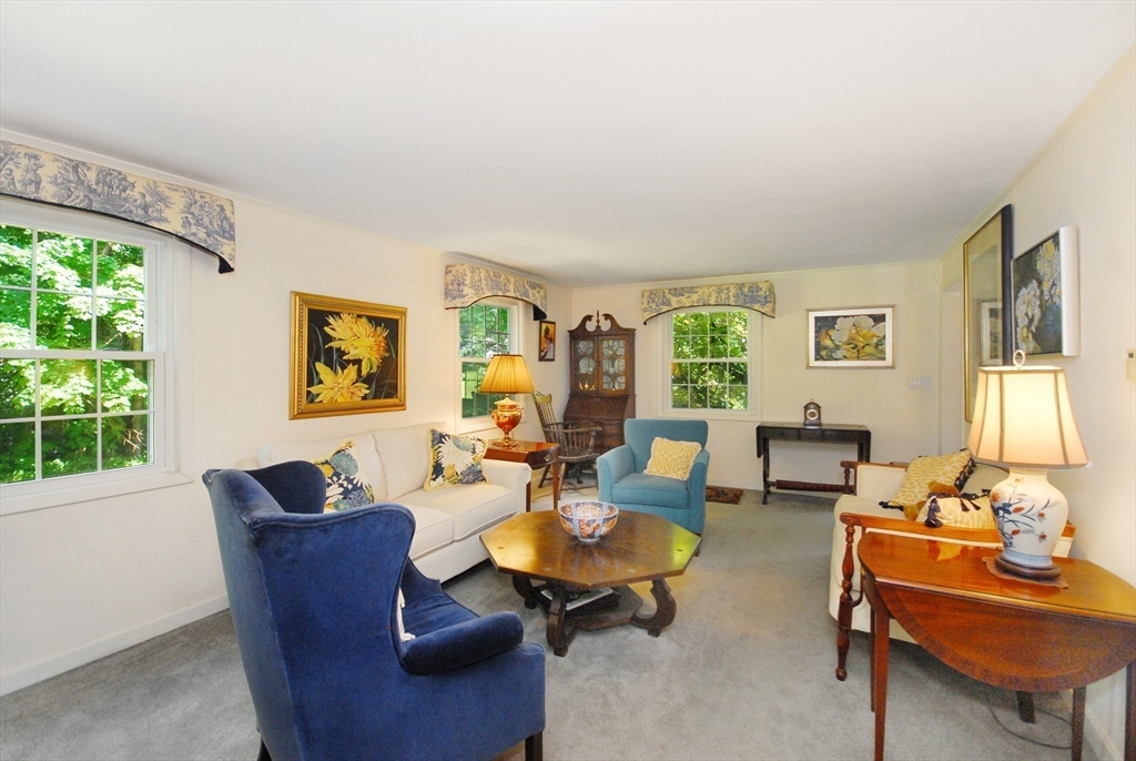 41 Clarissa Road Chelmsford, MA 01824 - Photo 8 of 26 a living room with furniture and a large window
