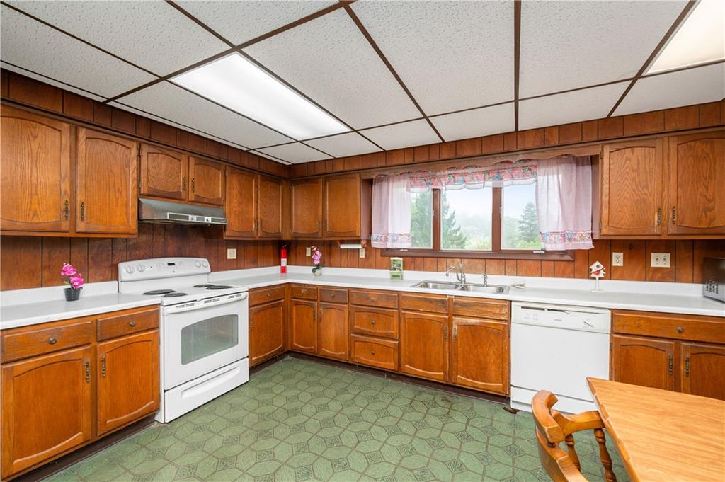 247 Welsh Road Valencia, PA 16059 - Photo 8 of 40 large kitchen for all those dinners with lots of countertops to bake or cook. Electric stove and dishwasher included.