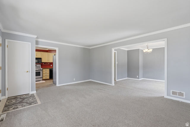 378 West 200 South Bountiful, UT 84010 - Photo 6 of 32 Light gray wall paint complemented by white crown molding and baseboards