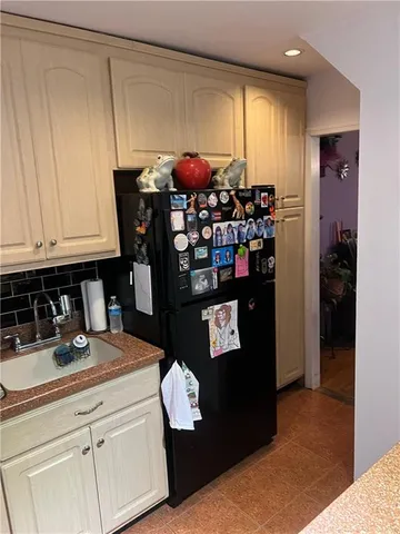 a kitchen with appliances cabinets and a counter top space