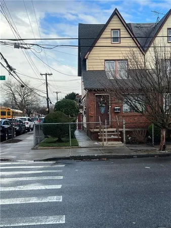 a view of a house with a street